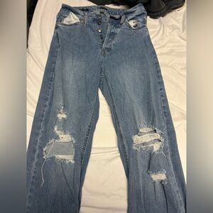 Distressed Blue Jeans